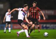 20 November 2020; Daniel Cleary of Dundalk in action against Evan Ferguson of Bohemians during the Extra.ie FAI Cup Quarter-Final match between Bohemians and Dundalk at Dalymount Park in Dublin. Photo by Ben McShane/Sportsfile