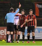 20 November 2020; Michael Barker of Bohemians, second from right, receives a red card from referee Rob Harvey during the Extra.ie FAI Cup Quarter-Final match between Bohemians and Dundalk at Dalymount Park in Dublin. Photo by Stephen McCarthy/Sportsfile