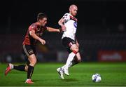 20 November 2020; Chris Shields of Dundalk in action against Dan Casey of Bohemians during the Extra.ie FAI Cup Quarter-Final match between Bohemians and Dundalk at Dalymount Park in Dublin. Photo by Ben McShane/Sportsfile