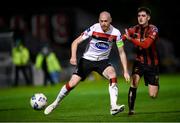 20 November 2020; Chris Shields of Dundalk in action against Dawson Devoy of Bohemians during the Extra.ie FAI Cup Quarter-Final match between Bohemians and Dundalk at Dalymount Park in Dublin. Photo by Stephen McCarthy/Sportsfile