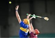 21 November 2020; Ronan Maher of Tipperary gathers possession ahead of Conor Whelan of Galway during the GAA Hurling All-Ireland Senior Championship Quarter-Final match between Galway and Tipperary at LIT Gaelic Grounds in Limerick. Photo by Piaras Ó Mídheach/Sportsfile