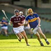 21 November 2020; Jake Morris of Tipperary in action against Aidan Harte of Galway during the GAA Hurling All-Ireland Senior Championship Quarter-Final match between Galway and Tipperary at LIT Gaelic Grounds in Limerick. Photo by David Fitzgerald/Sportsfile