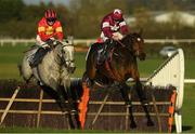 21 November 2020; Vanillier, left, with Jonathan Moore up, jump the last with eventual second place Fantasio D'alene, with Jack Kennedy up, on their way to winning the Irish Stallion Owners EBF Maiden Hurdle at Naas Racecourse in Kildare. Photo by Matt Browne/Sportsfile