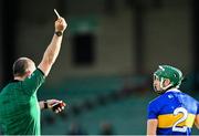21 November 2020; Cathal Barrett of Tipperary is shown his first yellow card by referee Johnny Murphy during the GAA Hurling All-Ireland Senior Championship Quarter-Final match between Galway and Tipperary at LIT Gaelic Grounds in Limerick. Photo by Piaras Ó Mídheach/Sportsfile