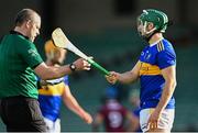 21 November 2020; Cathal Barrett of Tipperary in conversation with referee Johnny Murphy before being shown his first yellow card the GAA Hurling All-Ireland Senior Championship Quarter-Final match between Galway and Tipperary at LIT Gaelic Grounds in Limerick. Photo by Piaras Ó Mídheach/Sportsfile