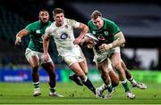 21 November 2020; Chris Farrell of Ireland is tackled by Ollie Lawrence of England during the Autumn Nations Cup match between England and Ireland at Twickenham Stadium in London, England. Photo by Matt Impey/Sportsfile