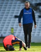 21 November 2020; Clare manager Brian Lohan looks at Tony Kelly of Clare as he goes down in the warm-up prior to  the GAA Hurling All-Ireland Senior Championship Quarter-Final match between Clare and Waterford at Pairc Uí Chaoimh in Cork. Photo by Harry Murphy/Sportsfile
