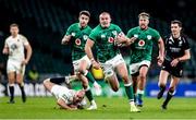 21 November 2020; Jacob Stockdale of Ireland beats the tackle of Dan Robson of England on the way to scoring his side's first try during the Autumn Nations Cup match between England and Ireland at Twickenham Stadium in London, England. Photo by Matt Impey/Sportsfile