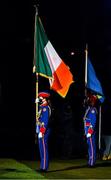 21 November 2020; Flag bearers and members of the Artane School of Music Rachel Dobbs, left, carrying the Irish national tricolour, and Michael Joyce, carrying the GAA flag, during the GAA Bloody Sunday Commemoration at Croke Park in Dublin. On this day 100 years ago, Sunday 21 November 1920, an attack by Crown Forces on the attendees at a challenge Gaelic Football match between Dublin and Tipperary during the Irish War of Independence resulted in 14 people being murdered. Along with the 13 supporters that lost their lives that day a Tipperary footballer, Michael Hogan, also died. The main stand in Croke Park, the Hogan Stand, was subsequently named after him. Photo by Brendan Moran/Sportsfile