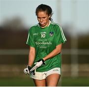 22 November 2020; Áine Cunningham of Limerick removes her gloves following defeat in the TG4 All-Ireland Junior Ladies Football Championship Semi-Final match between Fermanagh and Limerick at Coralstown-Kinnegad GAA in Kinnegad, Westmeath. Photo by Harry Murphy/Sportsfile