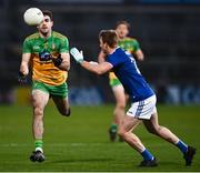22 November 2020; Caolan McGonigle of Donegal in action against Jason McLoughlin of Cavan during the Ulster GAA Football Senior Championship Final match between Cavan and Donegal at Athletic Grounds in Armagh. Photo by David Fitzgerald/Sportsfile