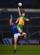 22 November 2020; Michael Langan of Donegal in action against Oisin Kernan of Cavan during the Ulster GAA Football Senior Championship Final match between Cavan and Donegal at Athletic Grounds in Armagh. Photo by David Fitzgerald/Sportsfile