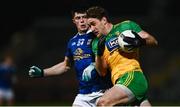 22 November 2020; Hugh McFadden of Donegal in action against James Smith of Cavan during the Ulster GAA Football Senior Championship Final match between Cavan and Donegal at Athletic Grounds in Armagh. Photo by David Fitzgerald/Sportsfile