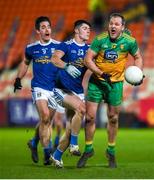 22 November 2020; Michael Murphy of Donegal in action against James Smith of Cavan and Killian Brady of Cavan during the Ulster GAA Football Senior Championship Final match between Cavan and Donegal at Athletic Grounds in Armagh. Photo by Philip Fitzpatrick/Sportsfile