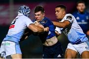 22 November 2020; Luke McGrath of Leinster is tackled by Matthew Morgan, left, and Ben Thomas of Cardiff Blues during the Guinness PRO14 match between Leinster and Cardiff Blues at the RDS Arena in Dublin. Photo by Ramsey Cardy/Sportsfile