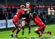 22 November 2020; Stewart Moore of Ulster is tackled by Steff Evans and Angus O'Brien of Scarlets during the Guinness PRO14 match between Ulster and Scarlets at Kingspan Stadium in Belfast. Photo by John Dickson/Sportsfile
