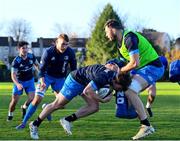 25 November 2020; David Hawkshaw is tackled by Josh Murphy during Leinster Rugby squad training at UCD in Dublin. Photo by Ramsey Cardy/Sportsfile