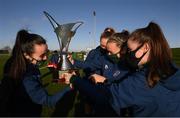 25 November 2020; Players, from left, Niamh Farrelly, Claire Walsh, Katie McCabe and Niamh Reid-Burke examine the previous winners of the Women's National League on the trophy during a Republic of Ireland Women training session at the FAI National Training Centre in Abbotstown, Dublin. Photo by Stephen McCarthy/Sportsfile