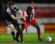 25 November 2020; Junior Ogedi-Uzokwe of Sligo Rovers in action against Cameron McJannett of Derry City during the Extra.ie FAI Cup Quarter-Final match between Sligo Rovers and Derry City at The Showgrounds in Sligo. Photo by Harry Murphy/Sportsfile