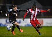 25 November 2020; Junior Ogedi-Uzokwe of Sligo Rovers in action against Colm Horgan of Derry City during the Extra.ie FAI Cup Quarter-Final match between Sligo Rovers and Derry City at The Showgrounds in Sligo. Photo by Harry Murphy/Sportsfile