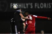 25 November 2020; Junior Ogedi-Uzokwe of Sligo Rovers heads at goal under pressure from Eoin Toal and Cameron McJannett of Derry City during the Extra.ie FAI Cup Quarter-Final match between Sligo Rovers and Derry City at The Showgrounds in Sligo. Photo by Harry Murphy/Sportsfile