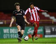 25 November 2020; Cameron McJannett of Derry City in action against Ryan De Vries of Sligo Rovers during the Extra.ie FAI Cup Quarter-Final match between Sligo Rovers and Derry City at The Showgrounds in Sligo. Photo by Harry Murphy/Sportsfile