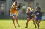 22 November 2020; Ciara Brown of Antrim in action against Sarah Miley, centre, and Marie Kealy, right, both of Wicklow during the TG4 All-Ireland Junior Ladies Football Championship Semi-Final match between Antrim and Wicklow at Donaghmore/Ashbourne GAA in Ashbourne, Meath. Photo by Sam Barnes/Sportsfile