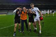 22 November 2020; Kildare players, from left, Mark Doyle, Seán Bean and James Burke with selector Declan O'Toole celebrate after the Christy Ring Cup Final match between Down and Kildare at Croke Park in Dublin. Photo by Piaras Ó Mídheach/Sportsfile