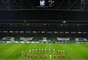 26 November 2020; Players from both teams observe a minutes silence for the late Diego Armando Maradona prior to the UEFA Europa League Group B match between Dundalk and SK Rapid Wien at Aviva Stadium in Dublin. Photo by Eóin Noonan/Sportsfile