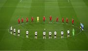 26 November 2020; Players from both sides stand for a minute's silence in memory of the late Diego Maradona prior to the start of the UEFA Europa League Group B match between Dundalk and SK Rapid Wien at Aviva Stadium in Dublin. Photo by Stephen McCarthy/Sportsfile