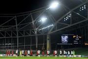 26 November 2020; Players of both side's stand for a minutes silence for the late Argentinian International Diego Maradona ahead of the UEFA Europa League Group B match between Dundalk and SK Rapid Wien at Aviva Stadium in Dublin. Photo by Ben McShane/Sportsfile