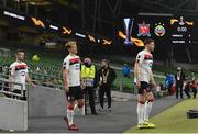 26 November 2020; Dundalk players, from left, Cameron Dummigan, Greg Sloggett and Andy Boyle walk out ahead of the UEFA Europa League Group B match between Dundalk and SK Rapid Wien at Aviva Stadium in Dublin. Photo by Ben McShane/Sportsfile