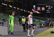 26 November 2020; Dundalk captain Chris Shields leads his side out ahead of the UEFA Europa League Group B match between Dundalk and SK Rapid Wien at Aviva Stadium in Dublin. Photo by Ben McShane/Sportsfile