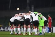 26 November 2020; Dundalk team huddle ahead of the UEFA Europa League Group B match between Dundalk and SK Rapid Wien at Aviva Stadium in Dublin. Photo by Ben McShane/Sportsfile