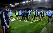 21 November 2020; Dublin media manager Seamus McCormack, left, as the captain prepares to lay a wreath after the Leinster GAA Football Senior Championship Final match between Dublin and Meath at Croke Park in Dublin. Photo by Ray McManus/Sportsfile