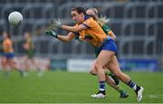 28 November 2020; Áine Keane of Clare in action against Megan Thynne of Meath during the TG4 All-Ireland Intermediate Ladies Football Championship Semi-Final match between Clare and Meath at MW Hire O'Moore Park in Portlaoise, Laois. Photo by Brendan Moran/Sportsfile
