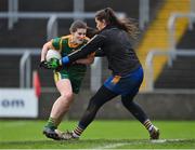 28 November 2020; Bridgetta Lynch of Meath is tackled by Micaela Glynn of Clare resulting in a penalty during the TG4 All-Ireland Intermediate Ladies Football Championship Semi-Final match between Clare and Meath at MW Hire O'Moore Park in Portlaoise, Laois. Photo by Brendan Moran/Sportsfile