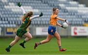 28 November 2020; Chloe Moloney of Clare in action against Orlagh Lally of Meath during the TG4 All-Ireland Intermediate Ladies Football Championship Semi-Final match between Clare and Meath at MW Hire O'Moore Park in Portlaoise, Laois. Photo by Brendan Moran/Sportsfile