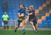 29 November 2020; Natalie McHugh of Roscommon in action against Fiona Claffey of Westmeath during the TG4 All-Ireland Intermediate Ladies Football Championship Semi-Final match between Roscommon and Westmeath at Glennon Brothers Pearse Park in Longford. Photo by Sam Barnes/Sportsfile