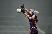 29 November 2020; Caroline Conway of Roscommon contests a high ball with Vicky Carr of Westmeath during the TG4 All-Ireland Intermediate Ladies Football Championship Semi-Final match between Roscommon and Westmeath at Glennon Brothers Pearse Park in Longford. Photo by Sam Barnes/Sportsfile