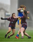 29 November 2020; Honor Ennis of Roscommon in action against Lucy McCartan, right, and Ciara Blundell of Westmeath during the TG4 All-Ireland Intermediate Ladies Football Championship Semi-Final match between Roscommon and Westmeath at Glennon Brothers Pearse Park in Longford. Photo by Sam Barnes/Sportsfile