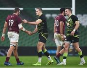 29 November 2020; Jacob Stockdale, left, and Shane Daly of Ireland shake hands with Giorgi Javakhia, left, and Mikheil Gachechiladze of Georgia following the Autumn Nations Cup match between Ireland and Georgia at the Aviva Stadium in Dublin. Photo by David Fitzgerald/Sportsfile