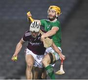 29 November 2020; Daithí Burke of Galway wins possession of the sliotar ahead of Seamus Flanagan of Limerick during the GAA Hurling All-Ireland Senior Championship Semi-Final match between Limerick and Galway at Croke Park in Dublin. Photo by Ray McManus/Sportsfile