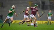 29 November 2020; Adrian Tuohey of Galway races clear of Cian Lynch of Limerick during the GAA Hurling All-Ireland Senior Championship Semi-Final match between Limerick and Galway at Croke Park in Dublin. Photo by Brendan Moran/Sportsfile