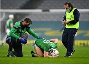 29 November 2020; Aaron Gillane of Limerick is tended to for a back injury by team physio Mark Melbourne, left, and team doctor Dr James Ryan during the GAA Hurling All-Ireland Senior Championship Semi-Final match between Limerick and Galway at Croke Park in Dublin. Photo by Piaras Ó Mídheach/Sportsfile
