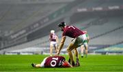 29 November 2020; Joseph Cooney of Galway checks on team-mate Joe Canning as he lies injured during the GAA Hurling All-Ireland Senior Championship Semi-Final match between Limerick and Galway at Croke Park in Dublin. Photo by Brendan Moran/Sportsfile
