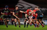 30 November 2020; Thomas Ahern of Munster is tackled by Mick Kearney of Zebre during the Guinness PRO14 match between Munster and Zebre at Thomond Park in Limerick. Photo by Ramsey Cardy/Sportsfile