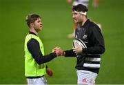 30 November 2020; Jack Crowley, left, and Thomas Ahern of Munster ahead of the Guinness PRO14 match between Munster and Zebre at Thomond Park in Limerick. Photo by Ramsey Cardy/Sportsfile