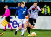 3 December 2020; Cameron Dummigan of Dundalk in action against Erling Knudtzon of Molde during the UEFA Europa League Group B match between Molde FK and Dundalk at Molde Stadion in Molde, Norway. Photo by Marius Simensen/Sportsfile