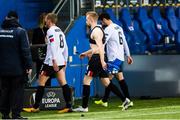 3 December 2020; Dundalk players, from left, John Mountney, Sean Hoare and Jordan Flores leave the pitch following the UEFA Europa League Group B match between Molde FK and Dundalk at Molde Stadion in Molde, Norway. Photo by Marius Simensen/Sportsfile